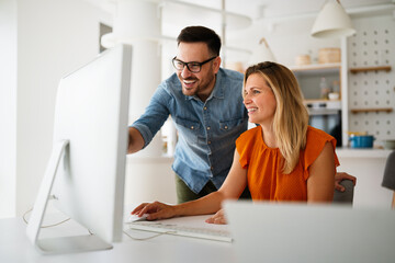 Portrait of success business people working together in home office. Couple teamwork startup concept