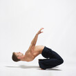 © Alexander Y - modern ballet male dancer posing over white studio background