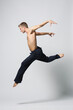 © Alexander Y - modern ballet male dancer posing over white studio background