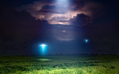 Wall Mural - scenic sci-fi image: ufo or alien spacecraft inspect green grass field with bright spotlight in dark