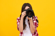 Teenager Lifestyle, Teen Hipster Hold Professional Camera. Girl With Photo Camera Photographing, Isolated On Studio Background.