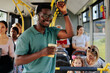 Happy african american rides public transportation