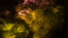 Yellow And Pink Steam On A Black Background.
