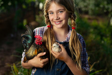Girl With Rooster And Chick