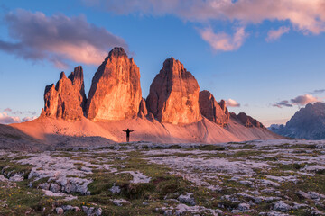 Fototapete - Hiker at Tre Cime di Lavaredo in the Dolomites mountains