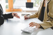 © Daenin - Teamwork with price chart analyzes business people on the table at the conference room.