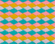 Geometric seamless knitted pattern. The texture is crocheted from multi-colored yarn. Repeating rhombuses.