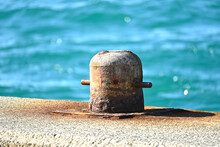 Rusty Anchor On The Beach
