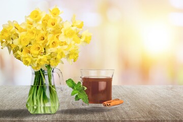 Wall Mural - Flowers and tea cup served for breakfast, valentine's day, wedding or anniversary morning decorations.