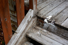 Close-up Of Old Wooden Stairs Badly Repaired