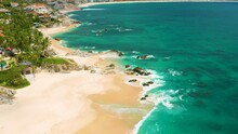 2020:PALMILLA BEACH CABO MEXICODJI.Drone Shot Of The Clean And Clear Ocean Water Crashing Into The Beach Shore
