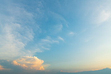 twilight blue bright and orange yellow dramatic sunset sky in countryside or beach colorful cloudsca
