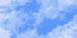 © Creative work - Blue skies with white clouds background. Romantic sky. Abstract nature background of romantic summer blue sky with fluffy clouds. Beautiful puffy clouds in bright blue sky in day sunlight.><