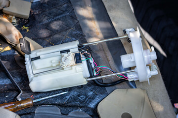 Maintenance car fuel pump module. Selective focus.