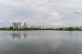 Fototapeta Tęcza - View of the pond of the city park