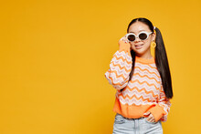 Waist Up Portrait Of Teenage Girl With Pigtails Over Vibrant Yellow Background, Copy Space