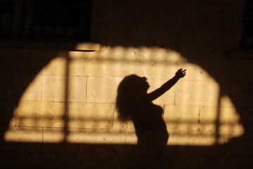 Poster - silhouette of a child playing with a ball