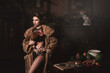 © blackday - Gorgeous woman wearing wearing fur coat is holding hen. Animal rights concept.