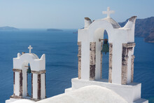 Santorini Bell Tower Of White Church In Oia With Sea View And Volcano, Greece Landmark