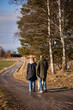 © Johnér - Couple walking with dog