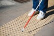 © Serhii - Close-up Of A Blind Man Standing With White Stick On Street