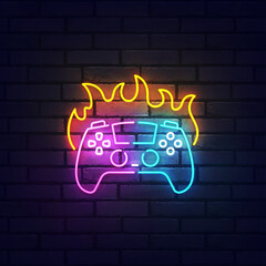 Game neon sign, bright signboard, light banner. Game joystick on fire logo neon, emblem. Vector illustration