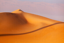 Picturesque Orange Sand Dunes In The Desert In United Arab Emirates