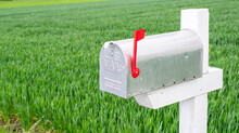 US Mailbox On A Green Background