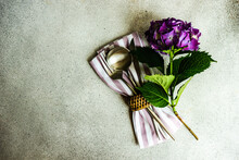 Place Setting With A Purple Hydrangea Flower