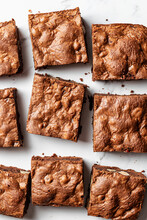 Delisious Brownies On Marble Background, Flat Lay Composition. Close Up Chocolate Pie