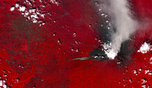 Top View Of Eruption At Mount Merapi, Indonesia, Hot Volcanic Avalanches From Merapi Volcano, Pyroclastic Flow,Gendol River, Red Vegetation Landscape,Gray Ash. Elements Of This Image Furnished By NASA
