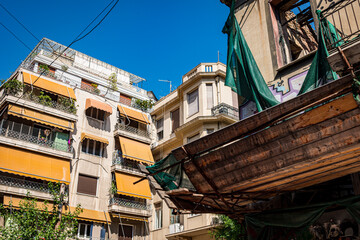 Sticker - old greek apartment houses in the city of Athens Greece