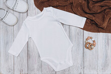 White Long Sleeve Baby Bodysuit Mockup, Top View.