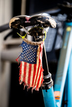Tattered Flag On Back Of Bike Seat