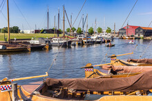 Traditional Wooden Boats In The Harbor Of Elburg, Netherlands