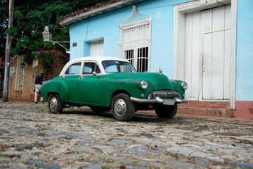 Wall Mural - old classic cars in the streets of trinidad