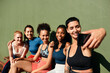 © C Malambo/peopleimages.com - A post-game selfie for social media. Cropped shot of a diverse group of sportswomen sitting together for a selfie after a basketball game during the day.