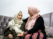 © Jasmin Merdan - Portrait of woman hugging daughter with positive face. Third age, Home care concept. High quality photo