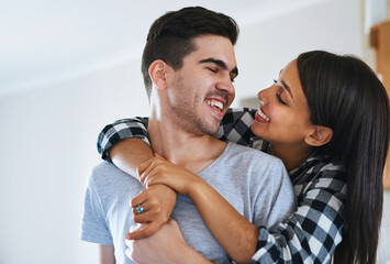 Poster - Have I told you lately that I love you. Shot of a happy young couple celebrating their move into a new home.