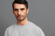 © SHOTPRIME STUDIO - handsome man in gray t-shirts posing lifestyle casual wear cropped view