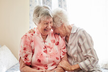 Nothing Inspires Happiness Like A Good Old Friend. Shot Of Two Happy Elderly Women Embracing Each Other At Home.