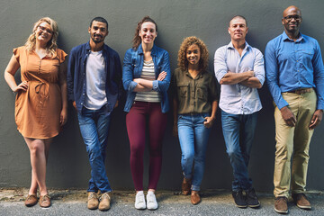 Poster - The greatest team youll ever see. Shot of a group cheerful friends standing together for a portrait while looking at the camera.