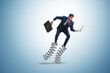 © Elnur - Businessman jumping high on springs