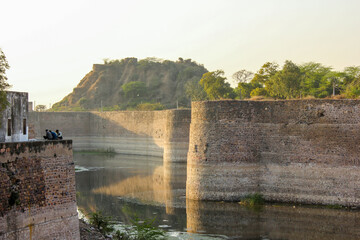 Poster - The ancient Lohagarh fort with the bridge across the river moat in the town of Bharatpur.