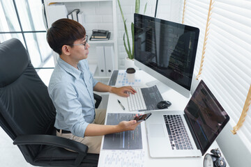Wall Mural - software development concept, male programmer check website programming on smartphone and computer