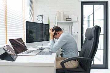 Wall Mural - software development concept, male programmer is stressed after having problem with programming