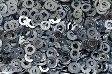 Bunch of stainless steel galvanized flat washers for fastener screws, nuts or bolts