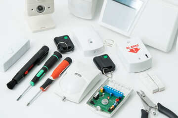 Close-up of home security equipment, on white background.