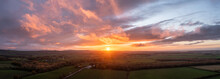 Epic Stunning Aerial Drone Landscape Sunset Image Of Lake DAistrict Countryside During Autumn