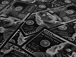 Wall Mural - american paper money. 100 dollar and other us banknotes. black and white background or backdrop. sav